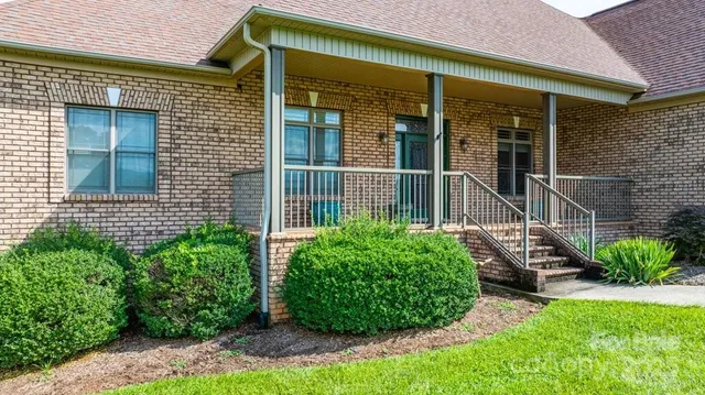 front view of a house with a garden