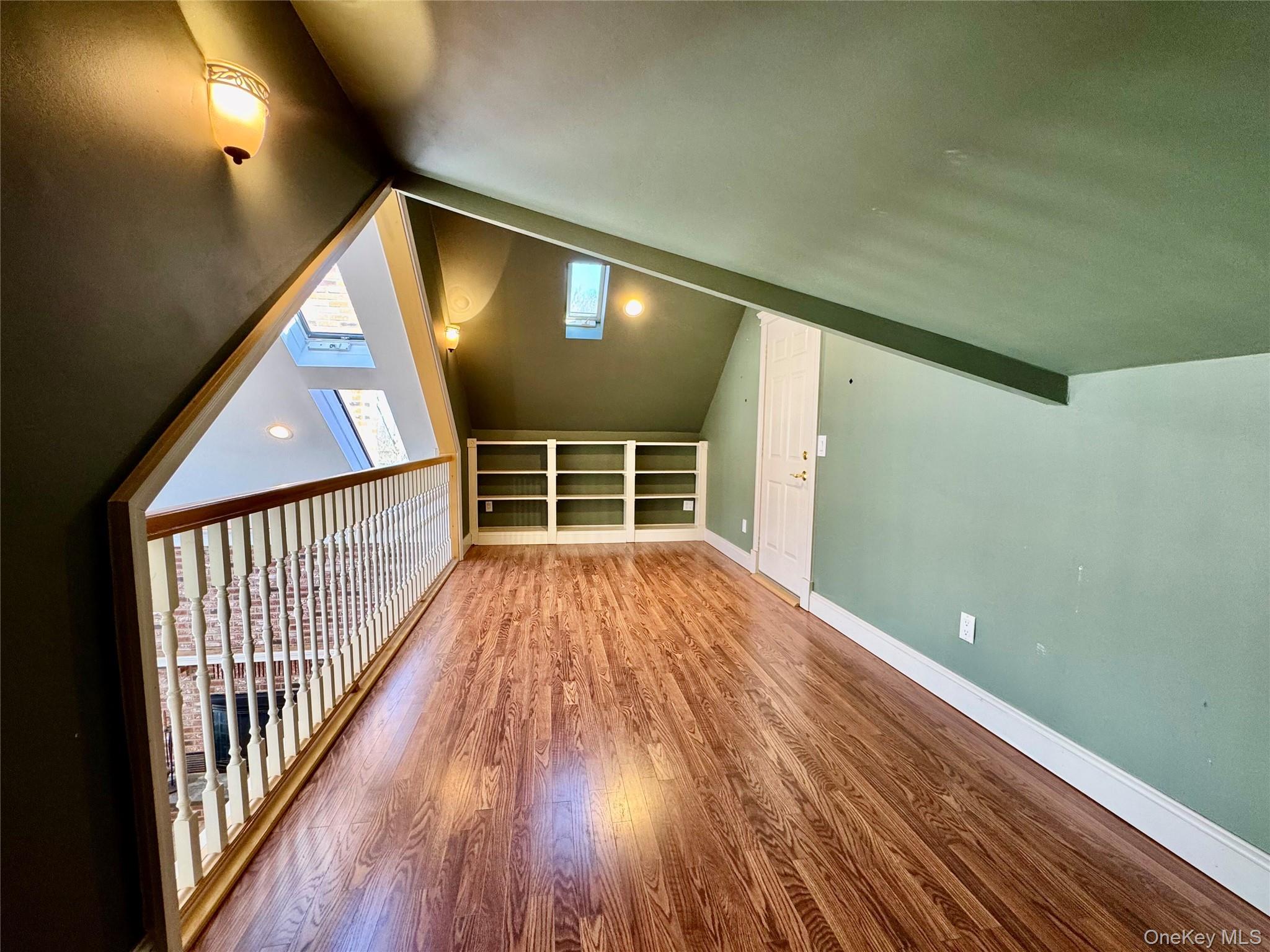886 Sound Shore Road Riverhead, NY 11901 - Photo 33 of 39 Loft overlooking the den and access to attic over the garage