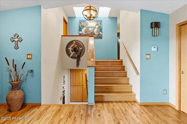 a view of a balcony with furniture