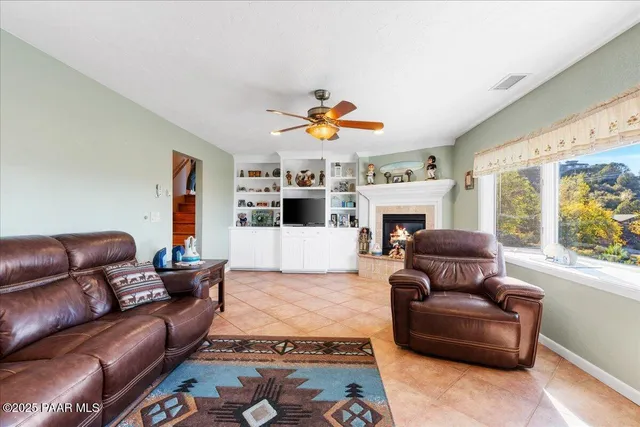 a bathroom with a sink double vanity granite and a mirror