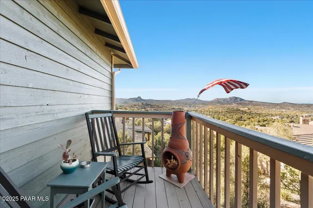 a view of a pathway both side of house