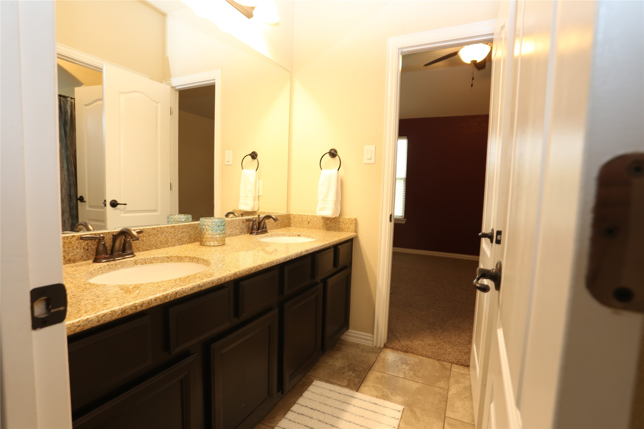 2033 Brodie Lane Conroe, TX 77301 - Photo 30 of 39 Jack and Jill between Bedrooms 2 & 3