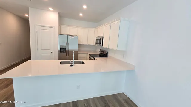 a room with a table and chairs