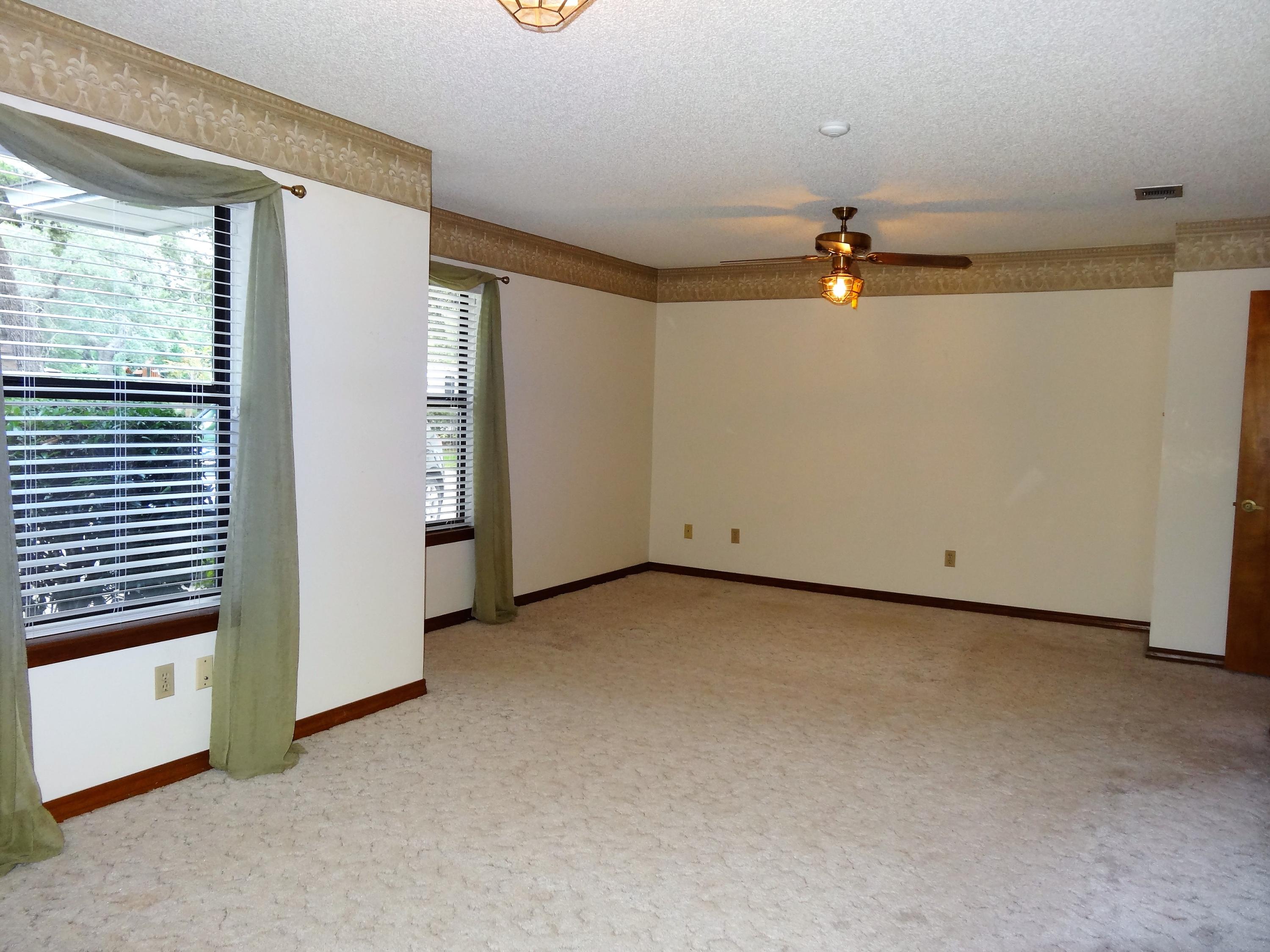 502 Nelson Point Road Niceville, FL 32578 - Photo 16 of 23 Master Bedroom w/Sitting Area