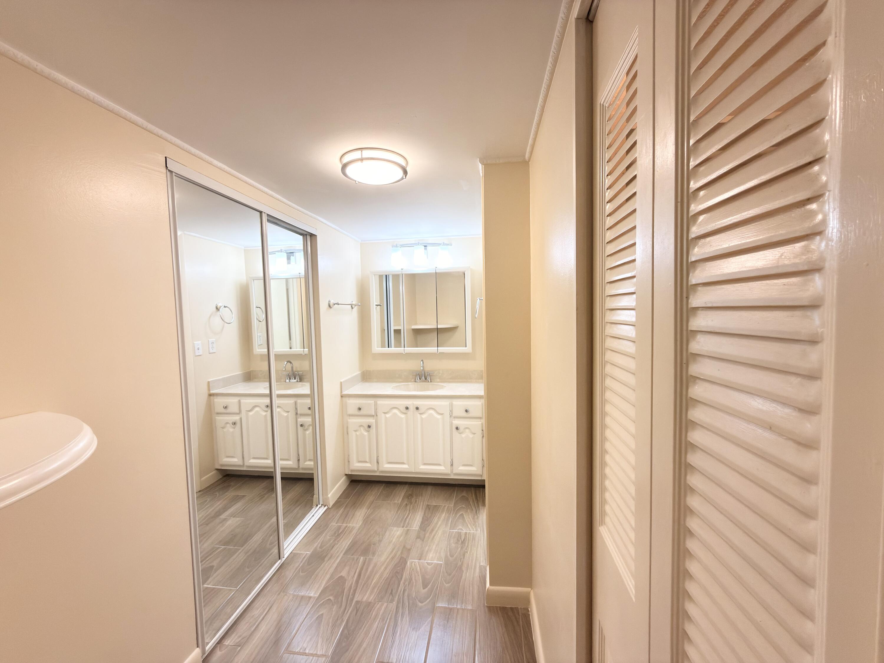 7650 West McNab Road, Unit 210 Tamarac, FL 33321 - Photo 7 of 13 En-suite Bathroom