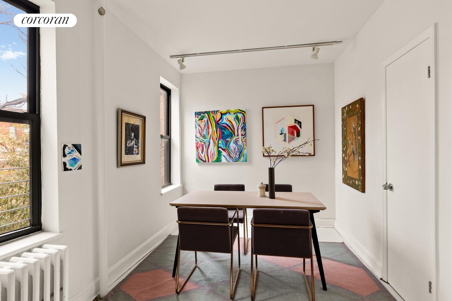 322 6th Street, Unit 20 Brooklyn, NY 11215 - Photo 2 of 7 a view of a workspace with furniture and furniture