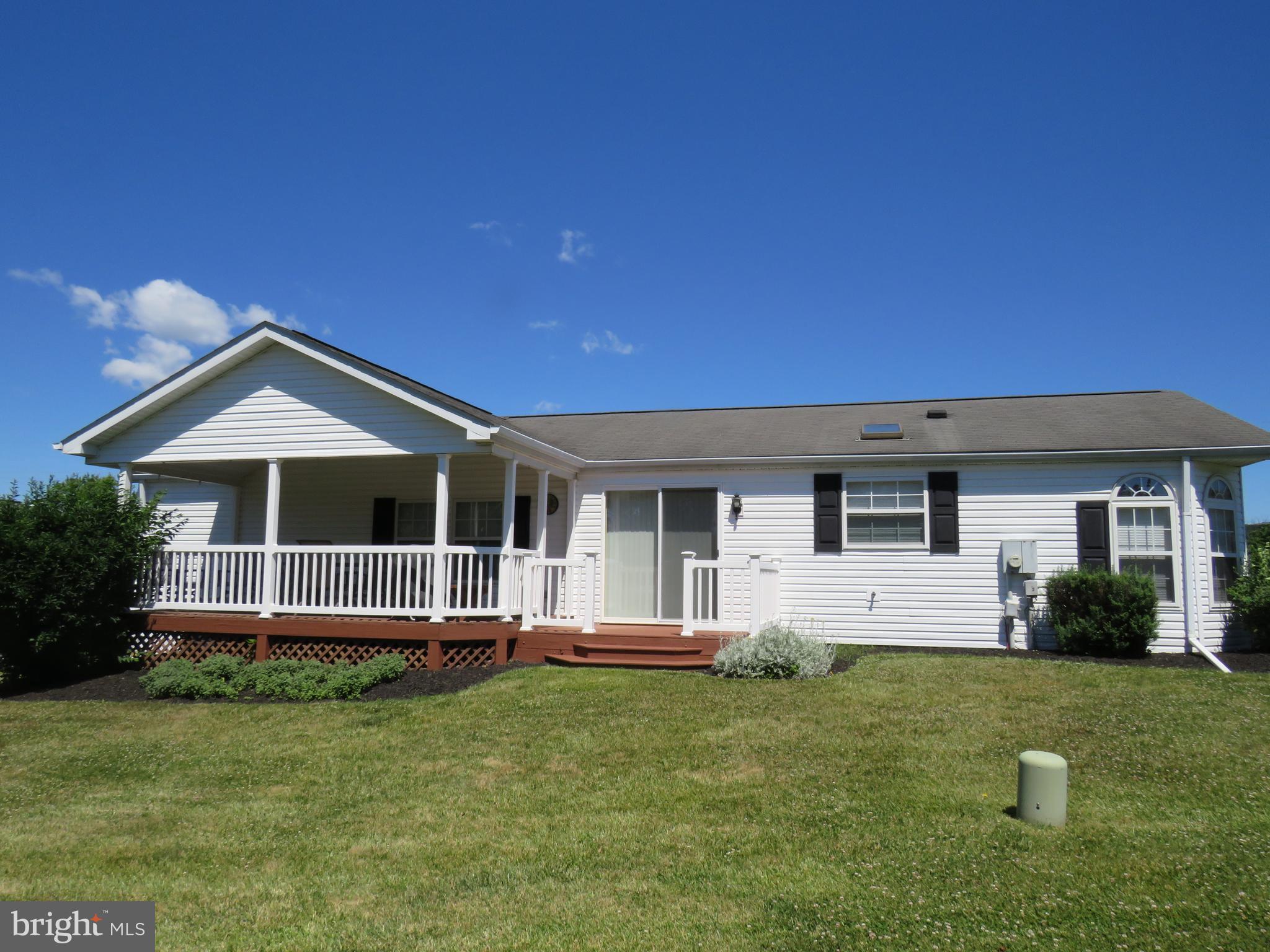 342 Spring Meadow Circle New Hope, PA 18938 - Photo 31 of 40 Side of house with covered porch