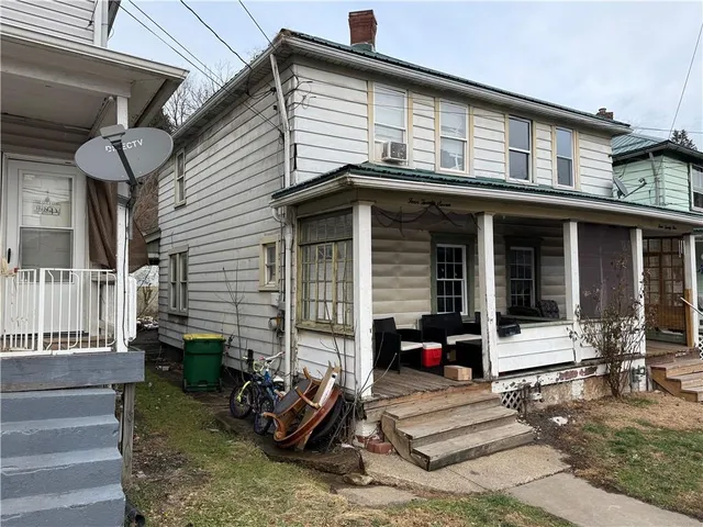 a view of a house with a patio