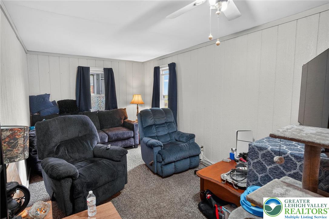 357 Main Road Lehighton, PA 18235 - Photo 28 of 38 a living room with furniture and a flat screen tv