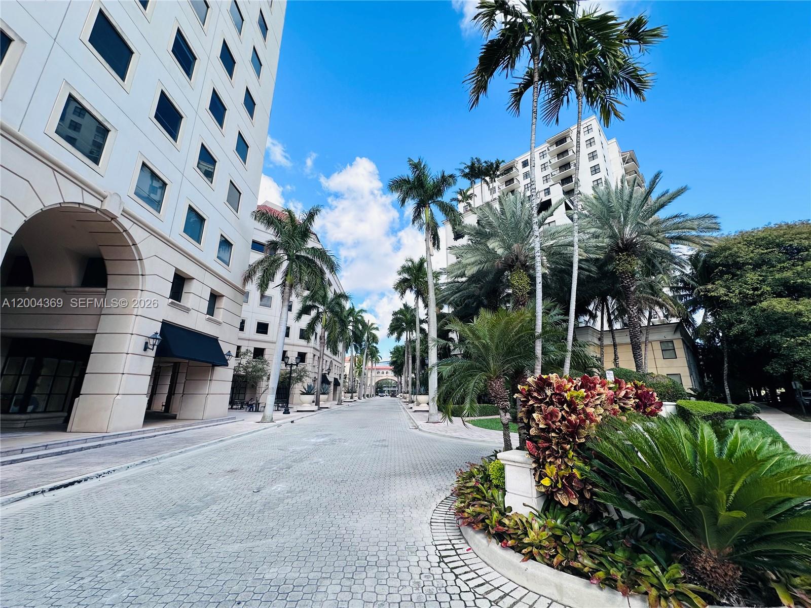 888 Douglas Road, Unit 1512 Coral Gables, FL 33134 - Photo 4 of 12 a view of a building and a street view