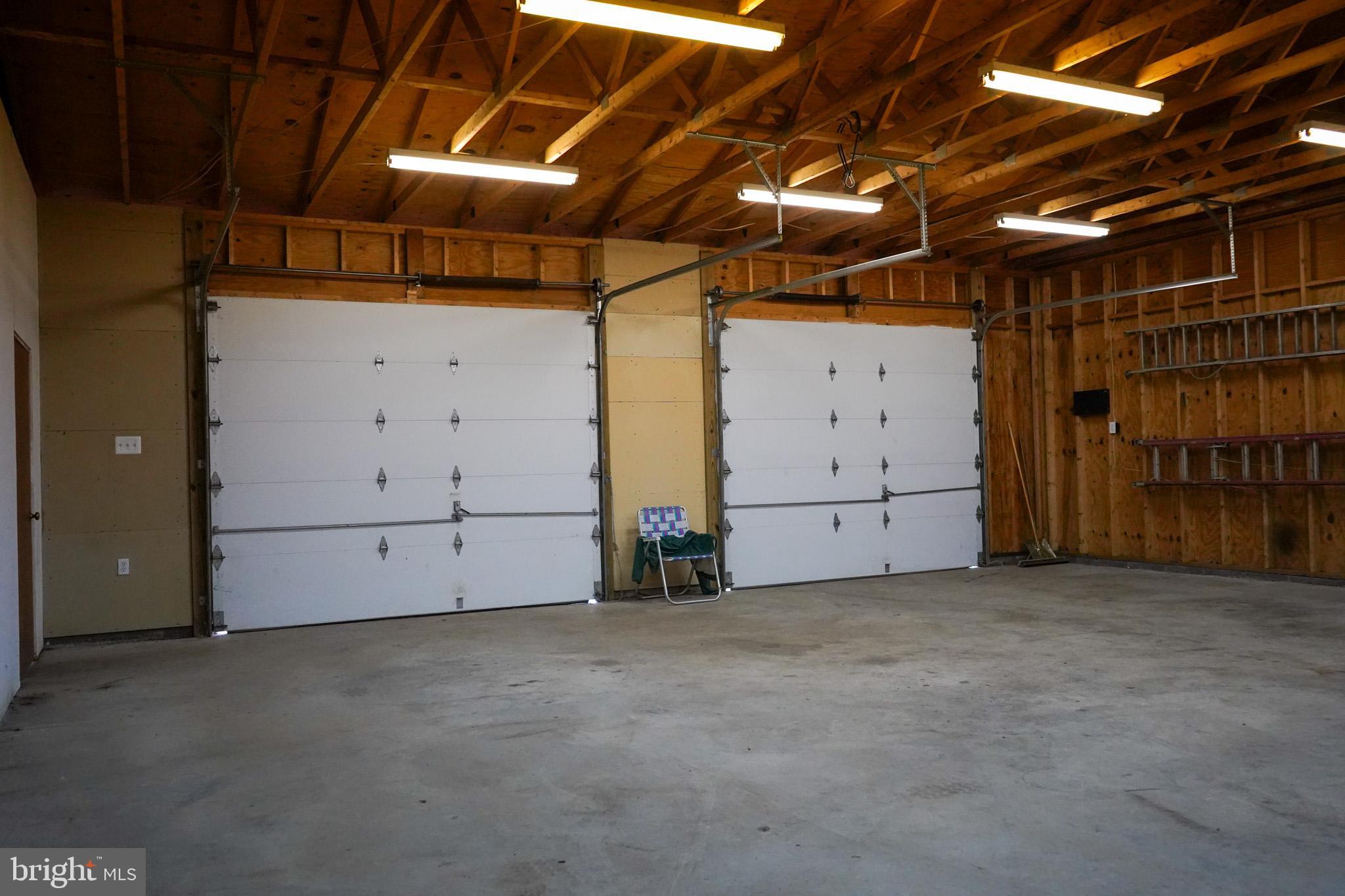 7323 O'Keefe Road Bealeton, VA 22712 - Photo 43 of 48 Spacious garage with high ceilings.