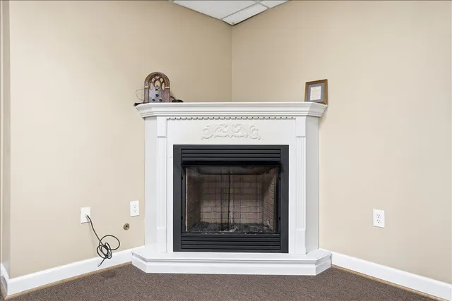 a living room with a fireplace