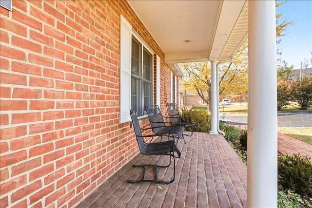a balcony with wooden floor