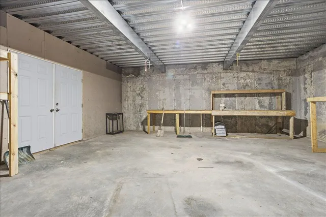 an empty room with fireplace