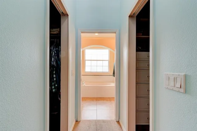 a view of a room that has a window