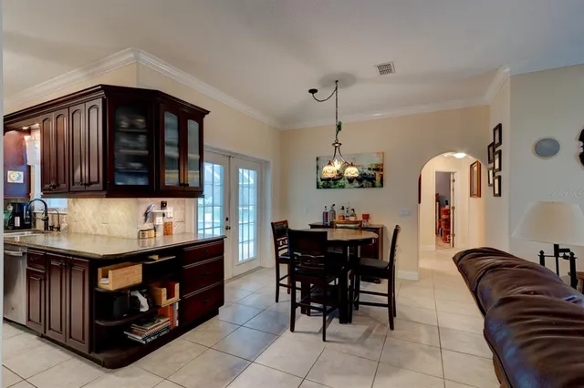 a view of kitchen island with furniture and window
