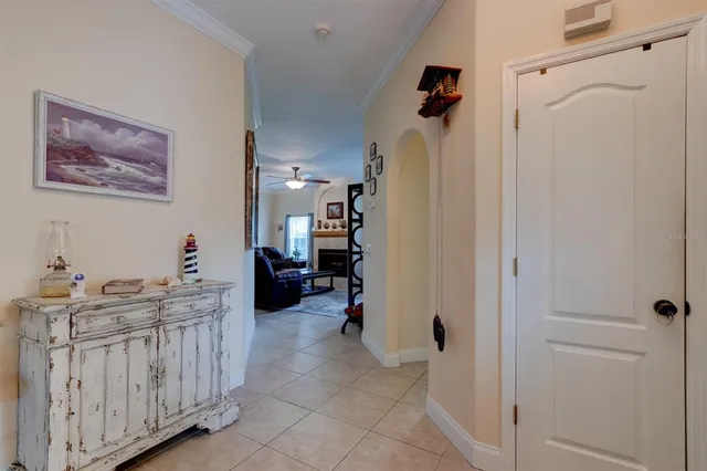 a view of a hallway with workspace to rooms