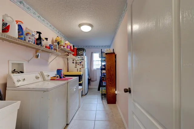 a storage room with washer and dryer