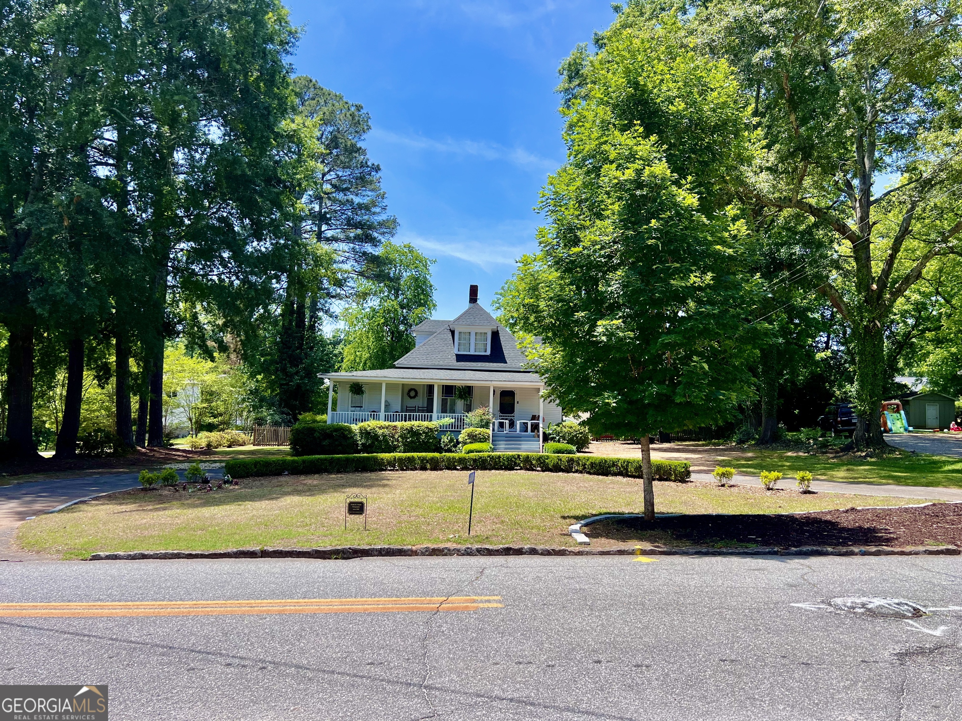 600 Foster Street Madison, GA 30650 - Photo 52 of 54 a view of a house with a yard