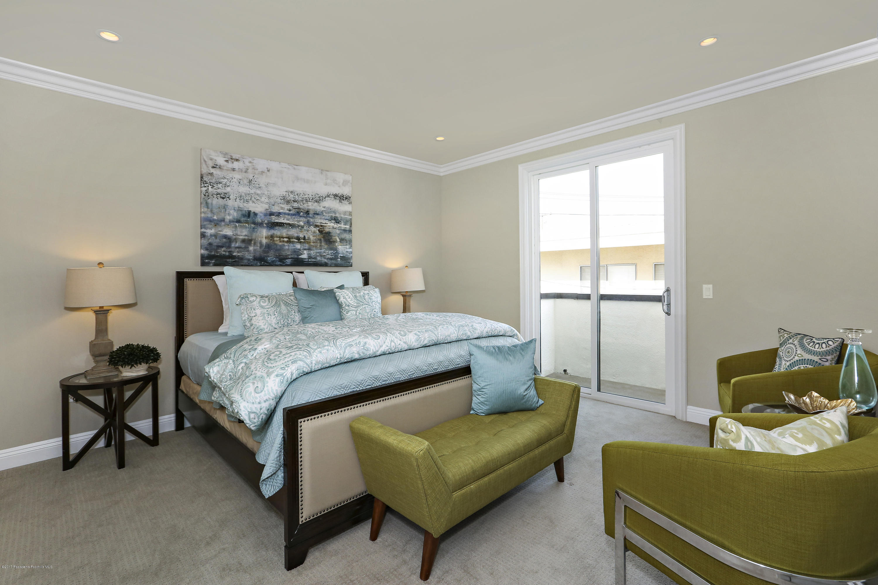 803 Arcadia Avenue, Unit A Arcadia, CA 91007 - Photo 12 of 42 a bedroom with a bed couch and window