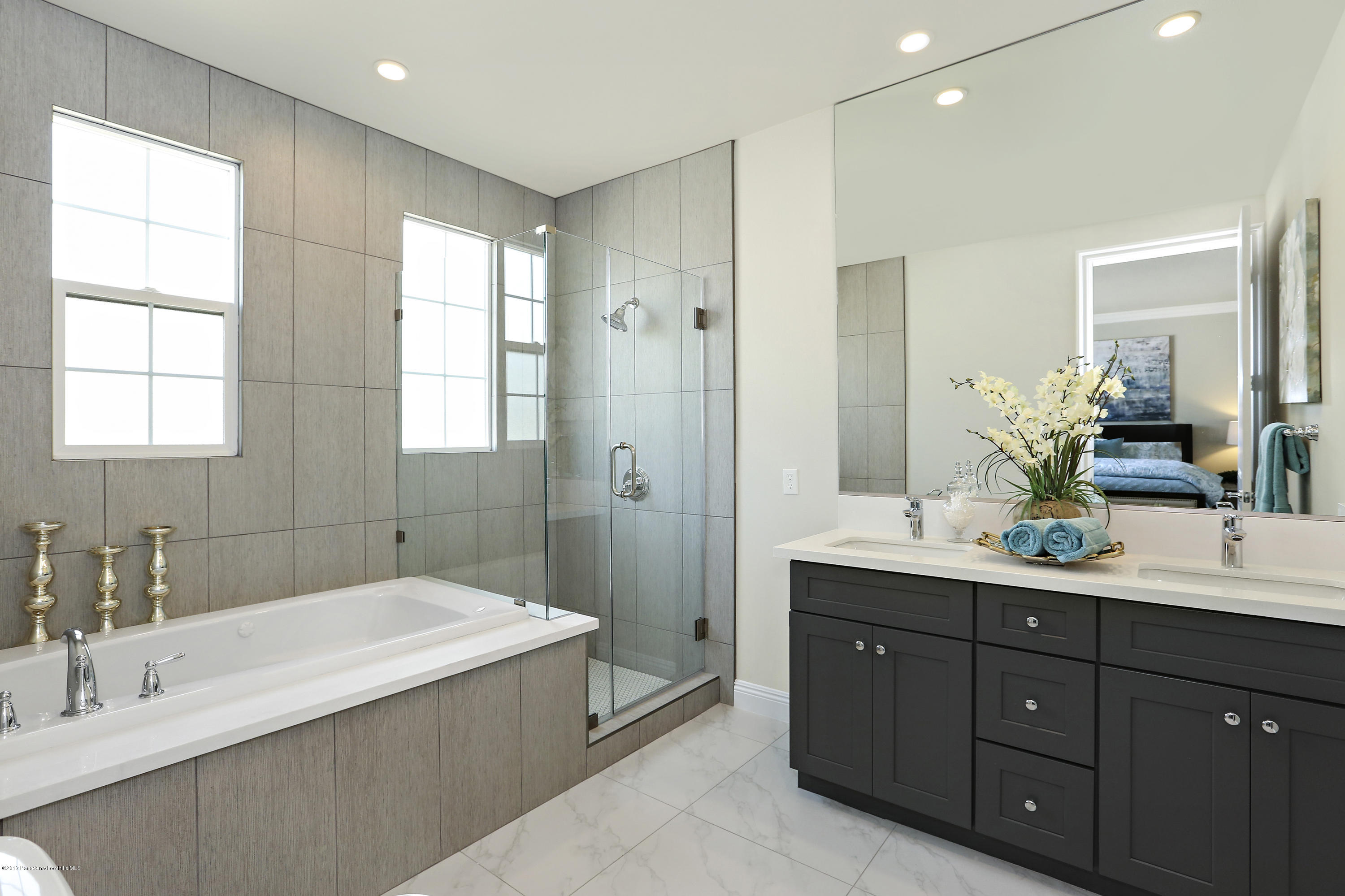 803 Arcadia Avenue, Unit A Arcadia, CA 91007 - Photo 14 of 42 a bathroom with a tub sink double vanity granite and a mirror