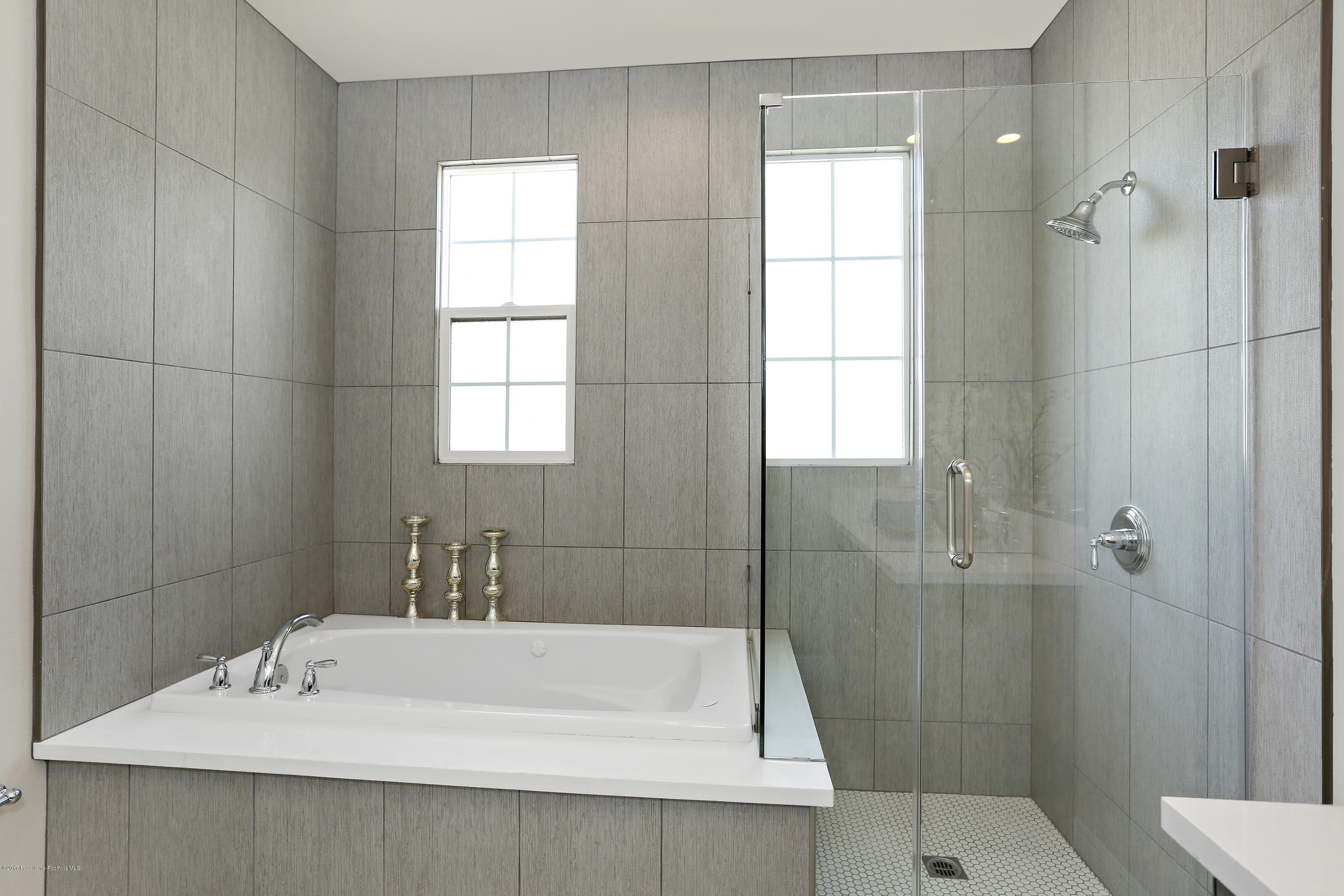 803 Arcadia Avenue, Unit A Arcadia, CA 91007 - Photo 15 of 42 a bathroom with a sink a toilet and shower