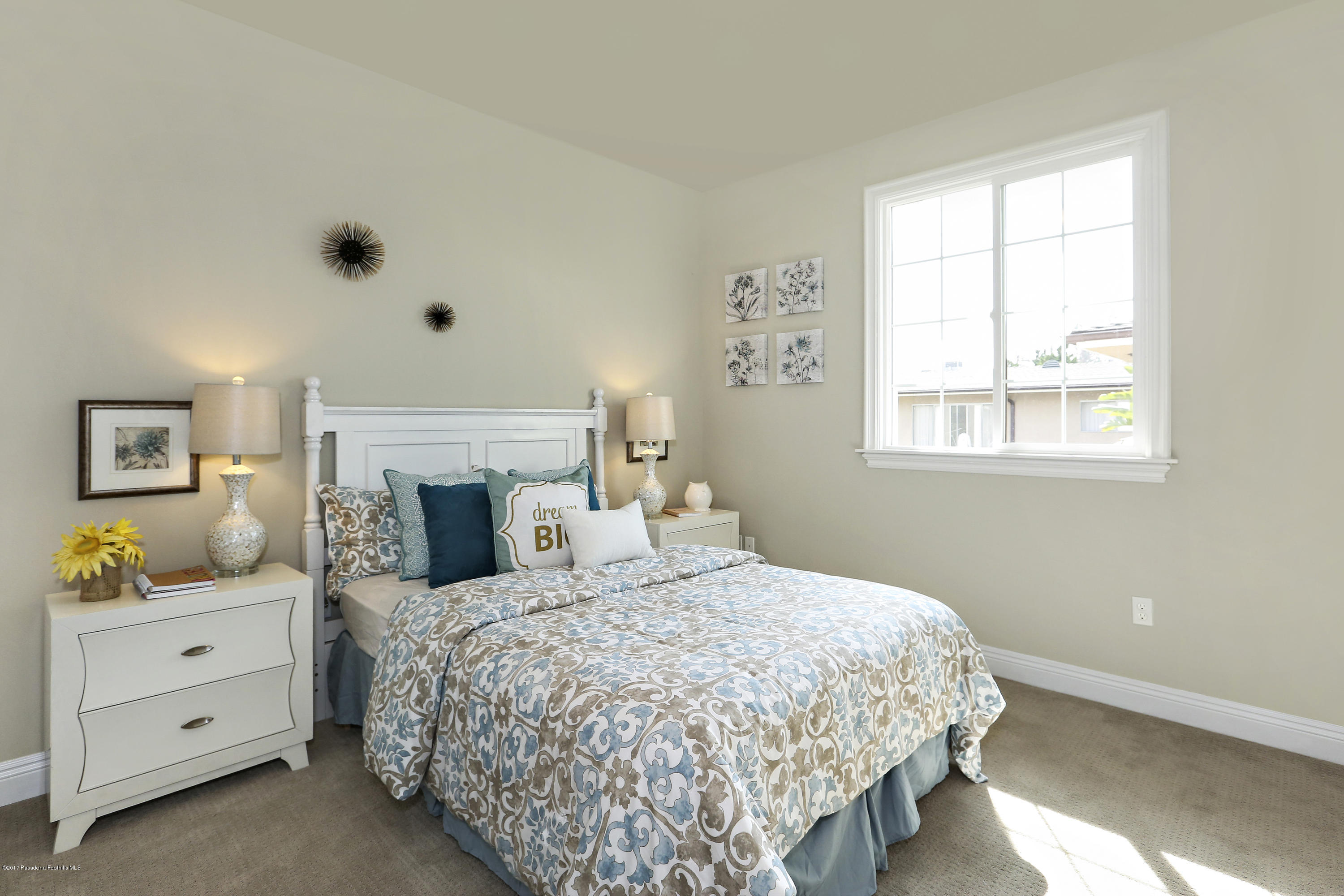 803 Arcadia Avenue, Unit A Arcadia, CA 91007 - Photo 16 of 42 a bedroom with a bed and a window dresser