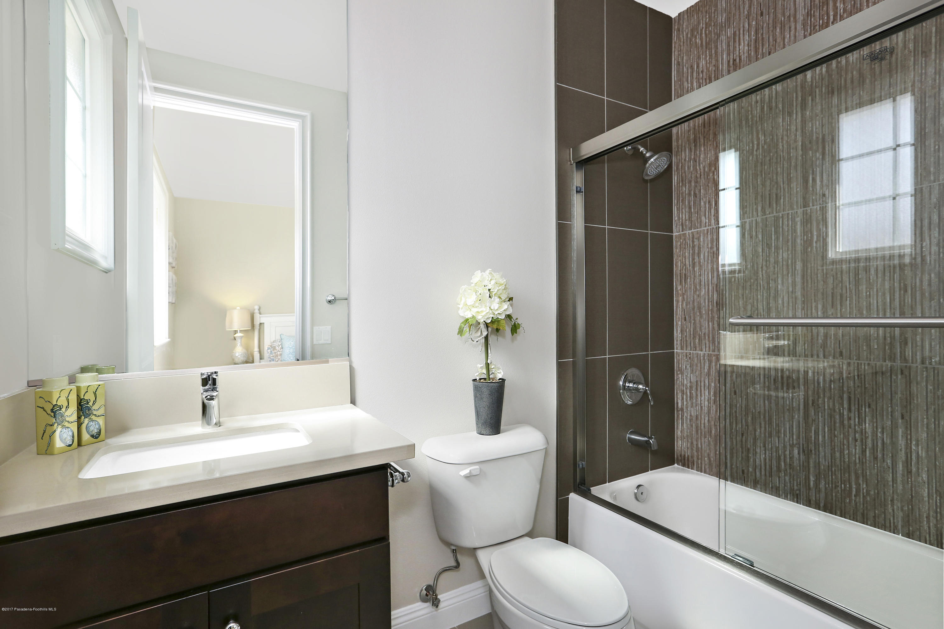 803 Arcadia Avenue, Unit A Arcadia, CA 91007 - Photo 17 of 42 a bathroom with a sink toilet and shower