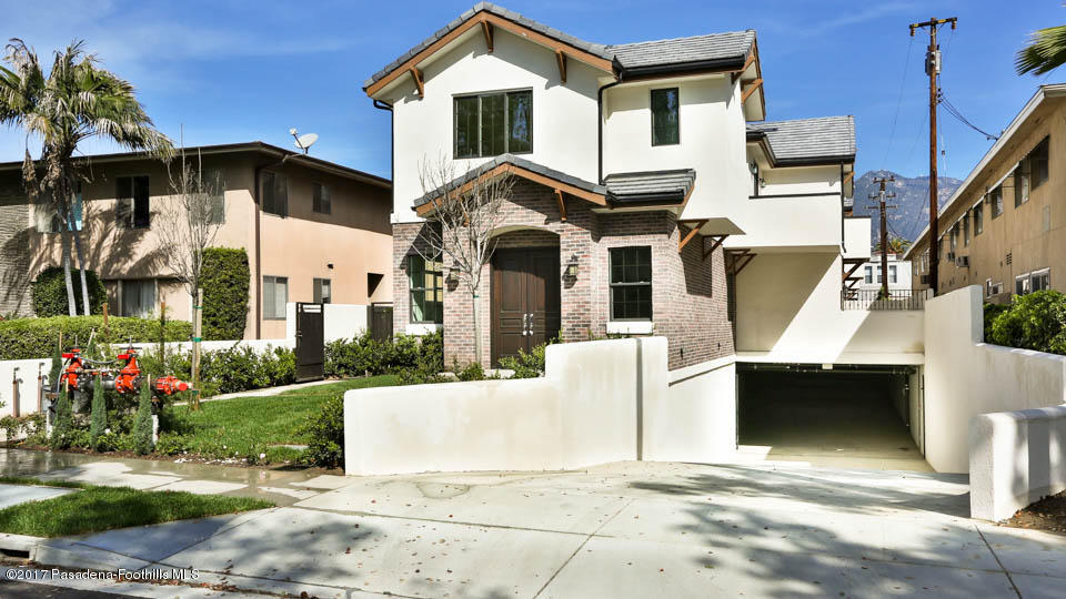 803 Arcadia Avenue, Unit A Arcadia, CA 91007 - Photo 26 of 42 a front view of a house with a garden