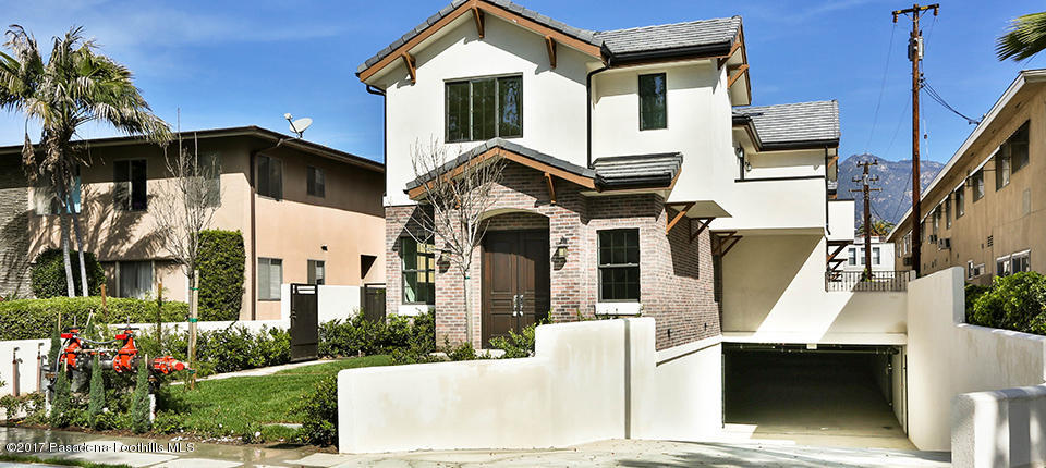 803 Arcadia Avenue, Unit A Arcadia, CA 91007 - Photo 28 of 42 a front view of a house with a garden