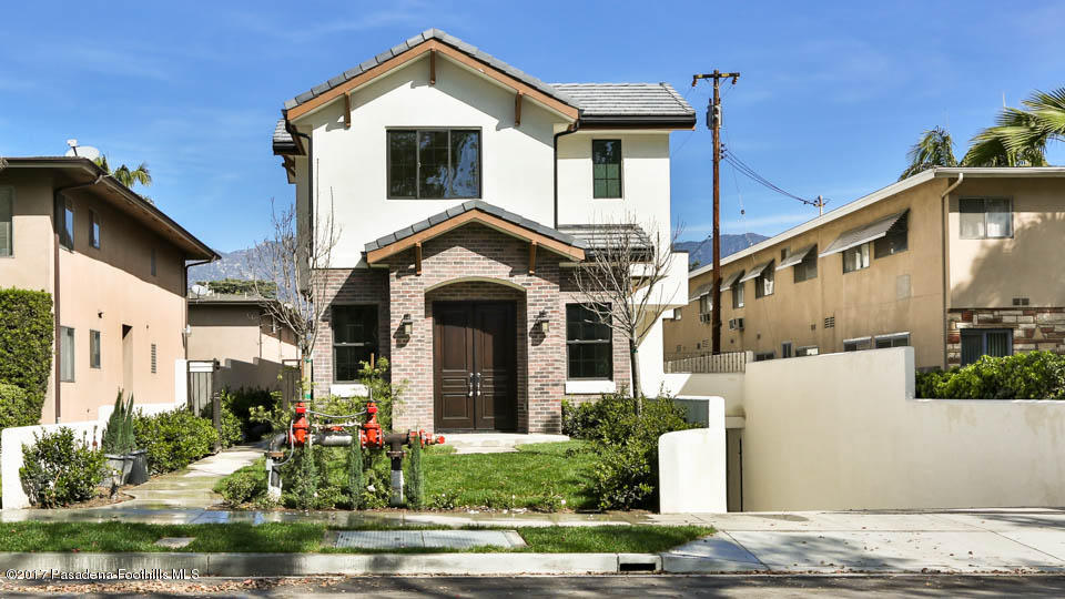 803 Arcadia Avenue, Unit A Arcadia, CA 91007 - Photo 30 of 42 a front view of a house with a yard