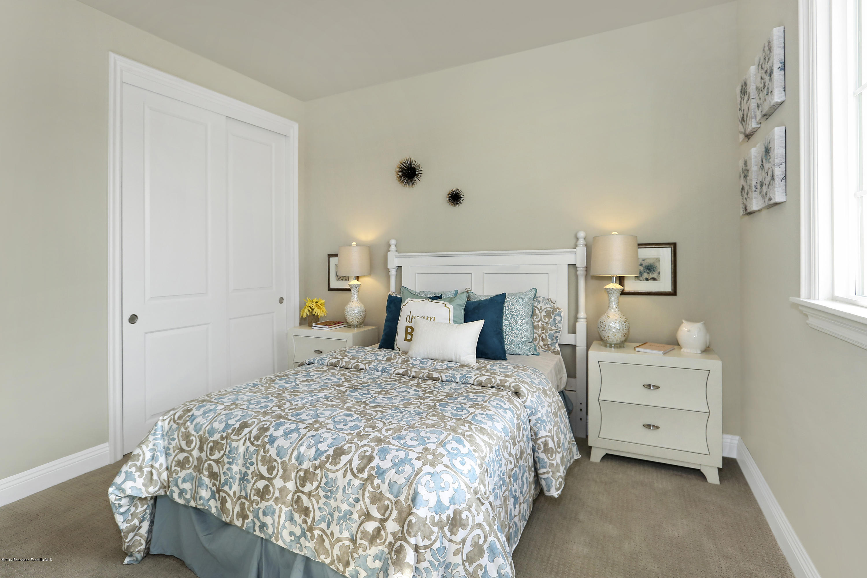 803 Arcadia Avenue, Unit A Arcadia, CA 91007 - Photo 40 of 42 a bedroom with a bed and a window