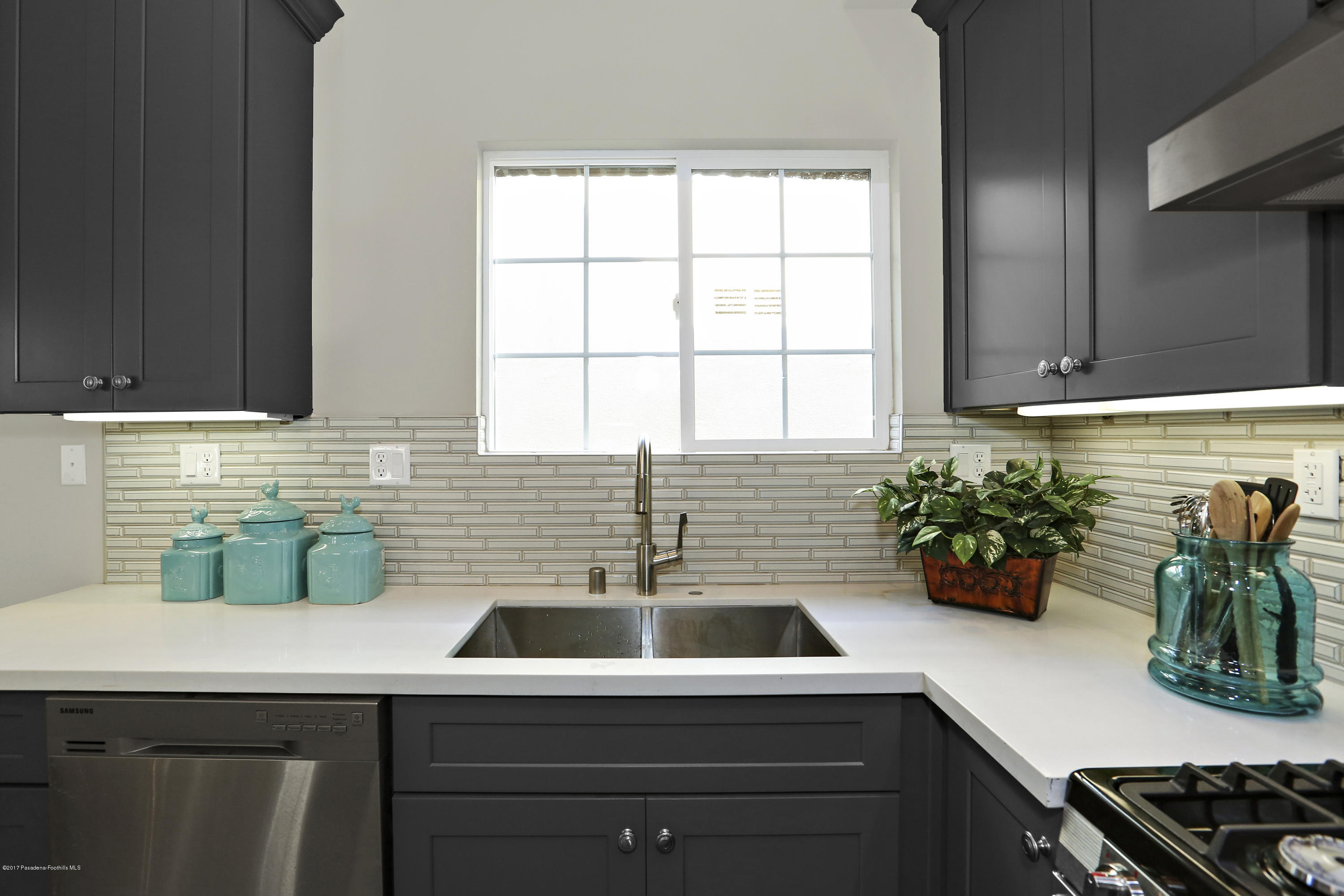 803 Arcadia Avenue, Unit A Arcadia, CA 91007 - Photo 5 of 42 a kitchen with a sink a potted plant and cabinets