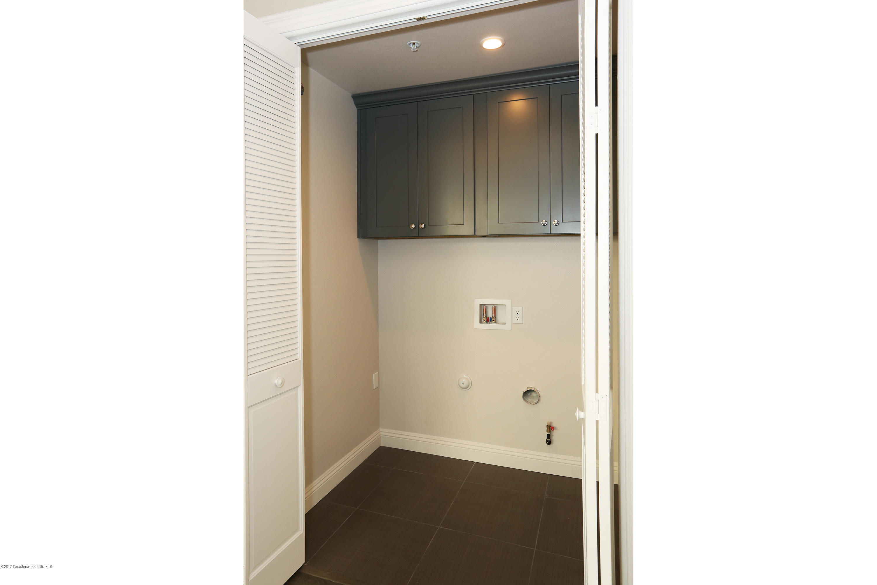 803 Arcadia Avenue, Unit A Arcadia, CA 91007 - Photo 42 of 42 a view of a room with door open and a microwave