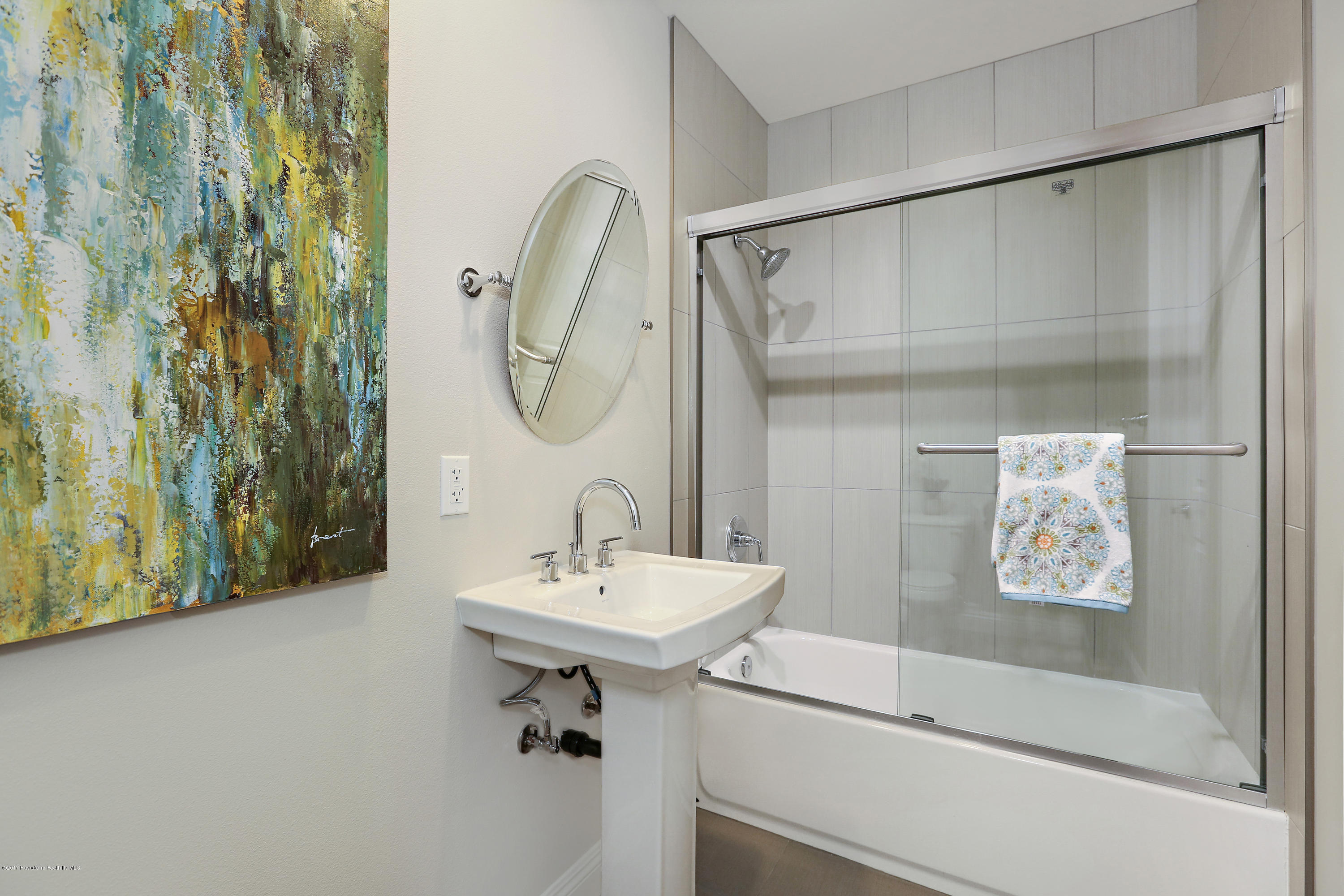 803 Arcadia Avenue, Unit A Arcadia, CA 91007 - Photo 10 of 42 a bathroom with a sink and a mirror