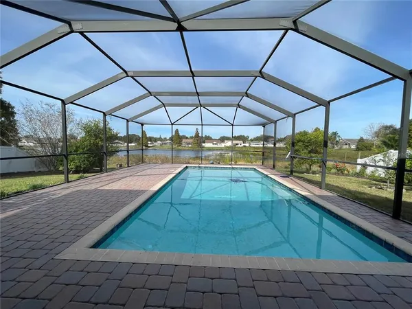 a view of a city with a lake