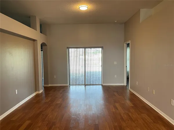 a kitchen with stainless steel appliances a sink a stove and a refrigerator