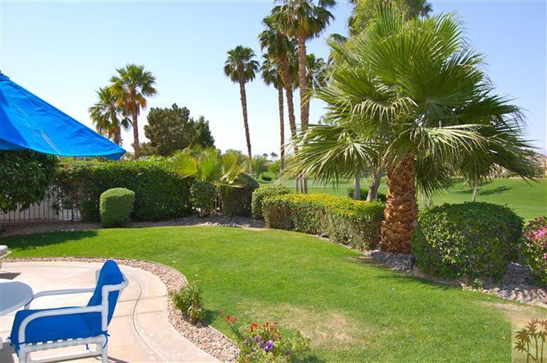39495 Manorgate Road Palm Desert, CA 92211 - Photo 4 of 22 a view of backyard with plants and outdoor seating
