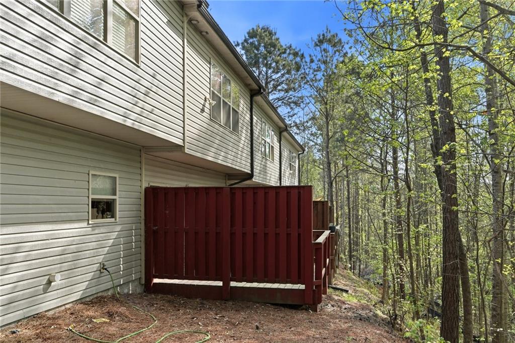 331 Turtle Creek Drive Winder, GA 30680 - Photo 25 of 25 a view of a house with a door and wooden walls