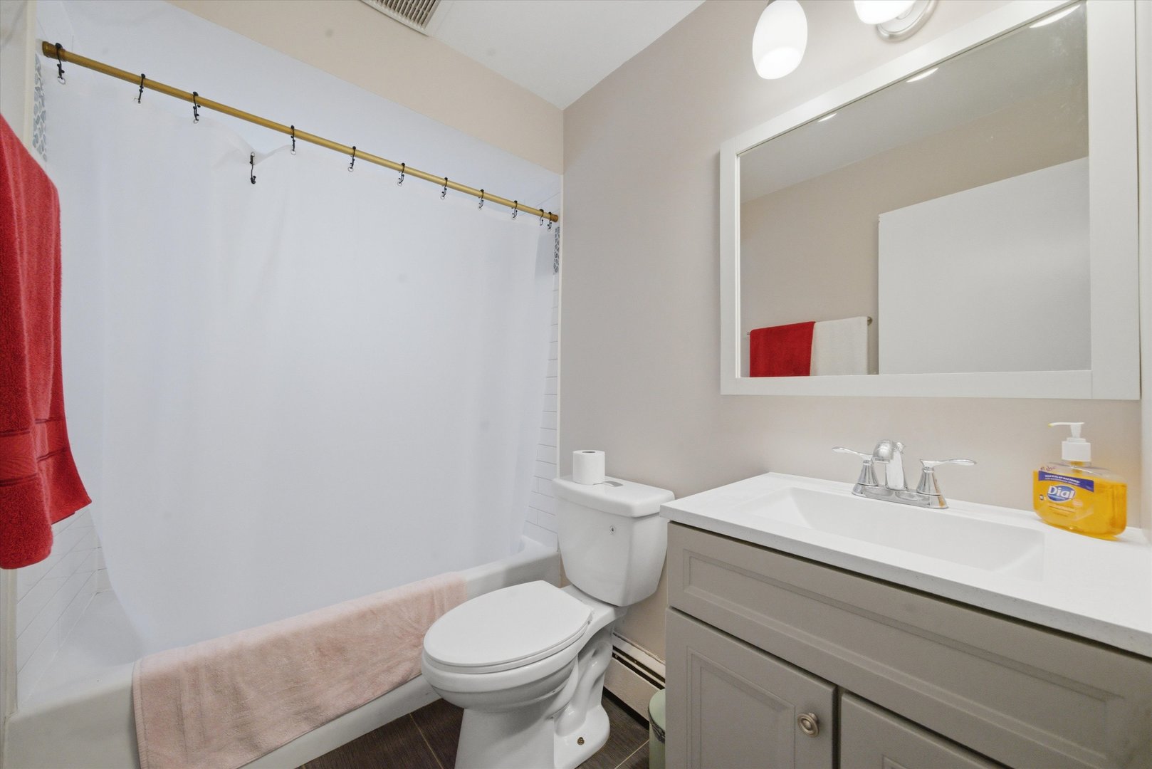 7412 West 63rd Place Summit, IL 60501 - Photo 30 of 49 a bathroom with a sink and a toilet