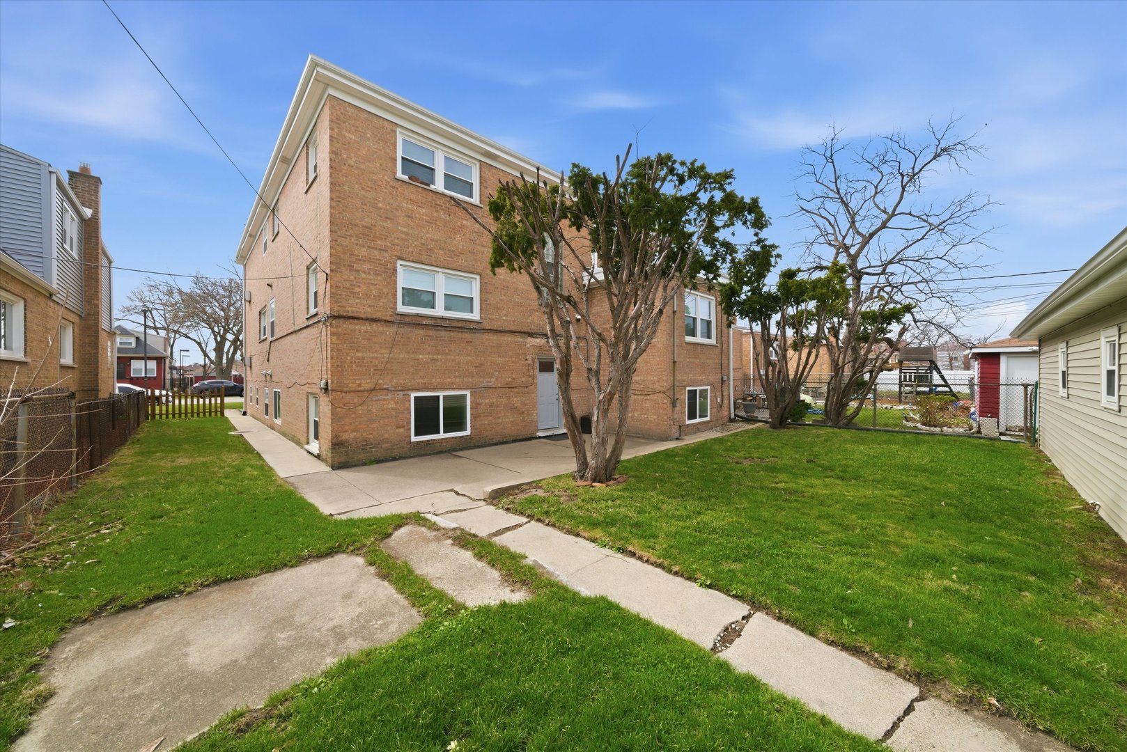 7412 West 63rd Place Summit, IL 60501 - Photo 3 of 49 a view of a house with a yard