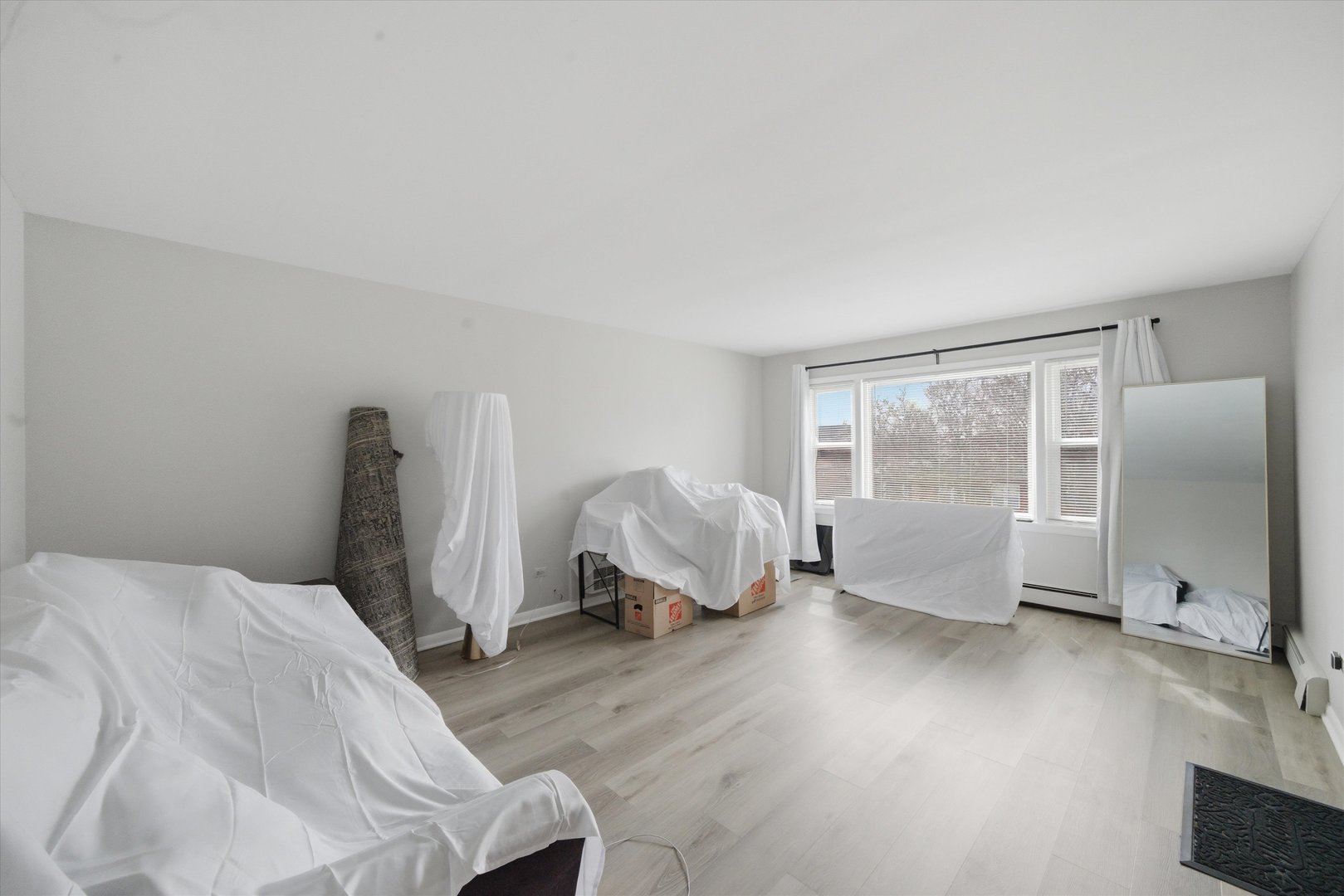 7412 West 63rd Place Summit, IL 60501 - Photo 40 of 49 a bedroom with a bed and a couch