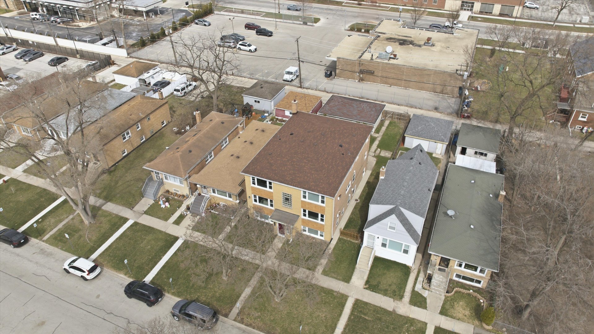 7412 West 63rd Place Summit, IL 60501 - Photo 45 of 49 an aerial view of residential house with parking