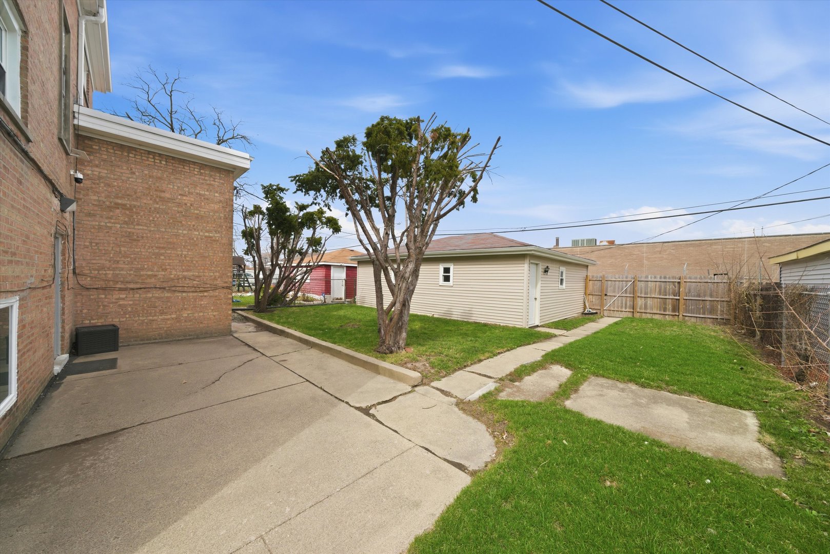 7412 West 63rd Place Summit, IL 60501 - Photo 47 of 49 a front view of a house with garden