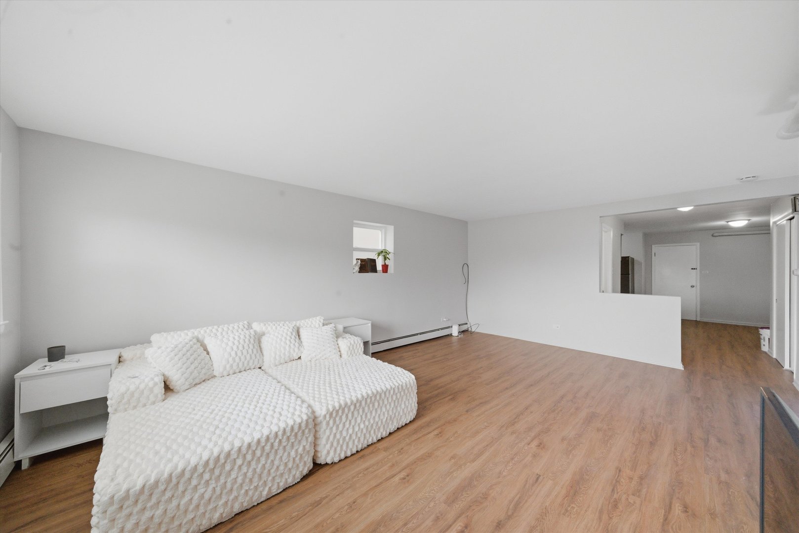 7412 West 63rd Place Summit, IL 60501 - Photo 9 of 49 a living room with furniture and a wooden floor