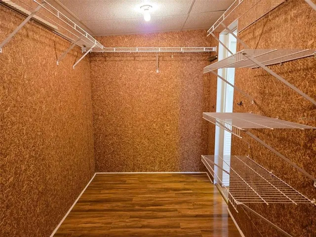 a view of a room with racks on the wall