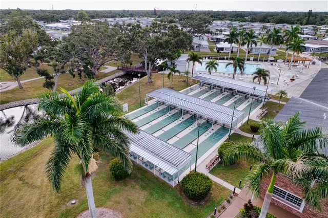 an aerial view of a house with a garden