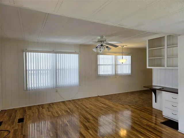 a view of an empty room and window