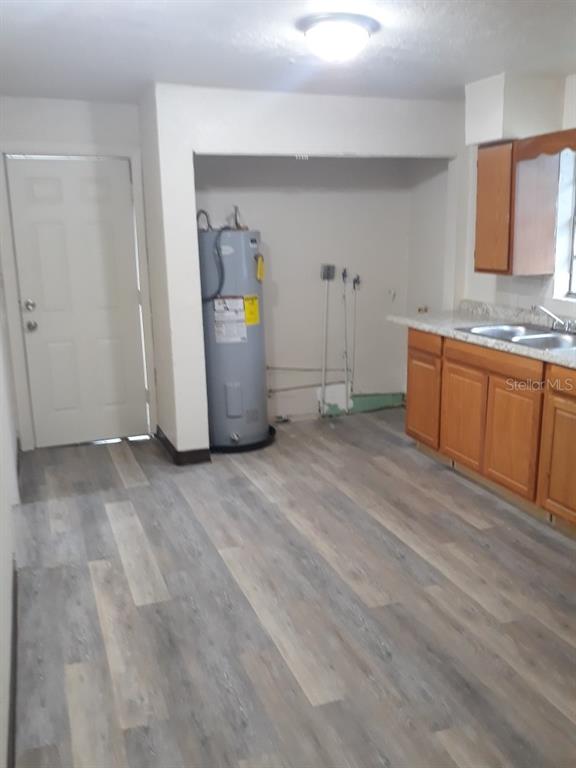 350 Maple Street Daytona Beach, FL 32114 - Photo 7 of 8 a view of a storage and utility room with window