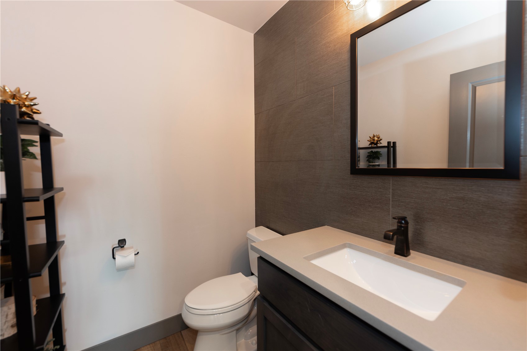 260 Fuller Placer Road Breckenridge, CO 80424 - Photo 30 of 32 a bathroom with a sink a toilet and a mirror